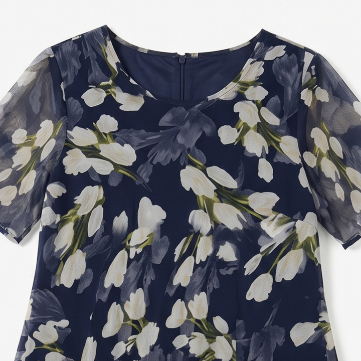 Genevora - Robe midi fleurie et aérienne