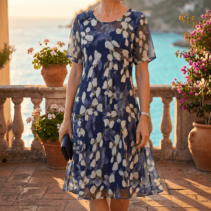 Genevora - Robe midi fleurie et aérienne