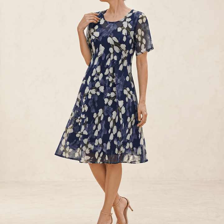 Genevora - Robe midi fleurie et aérienne