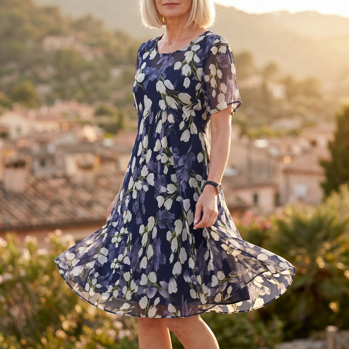 Genevora - Robe midi fleurie et aérienne