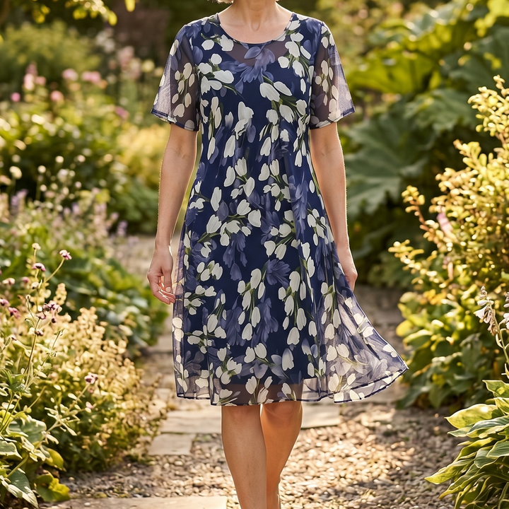 Genevora - Robe midi fleurie et aérienne