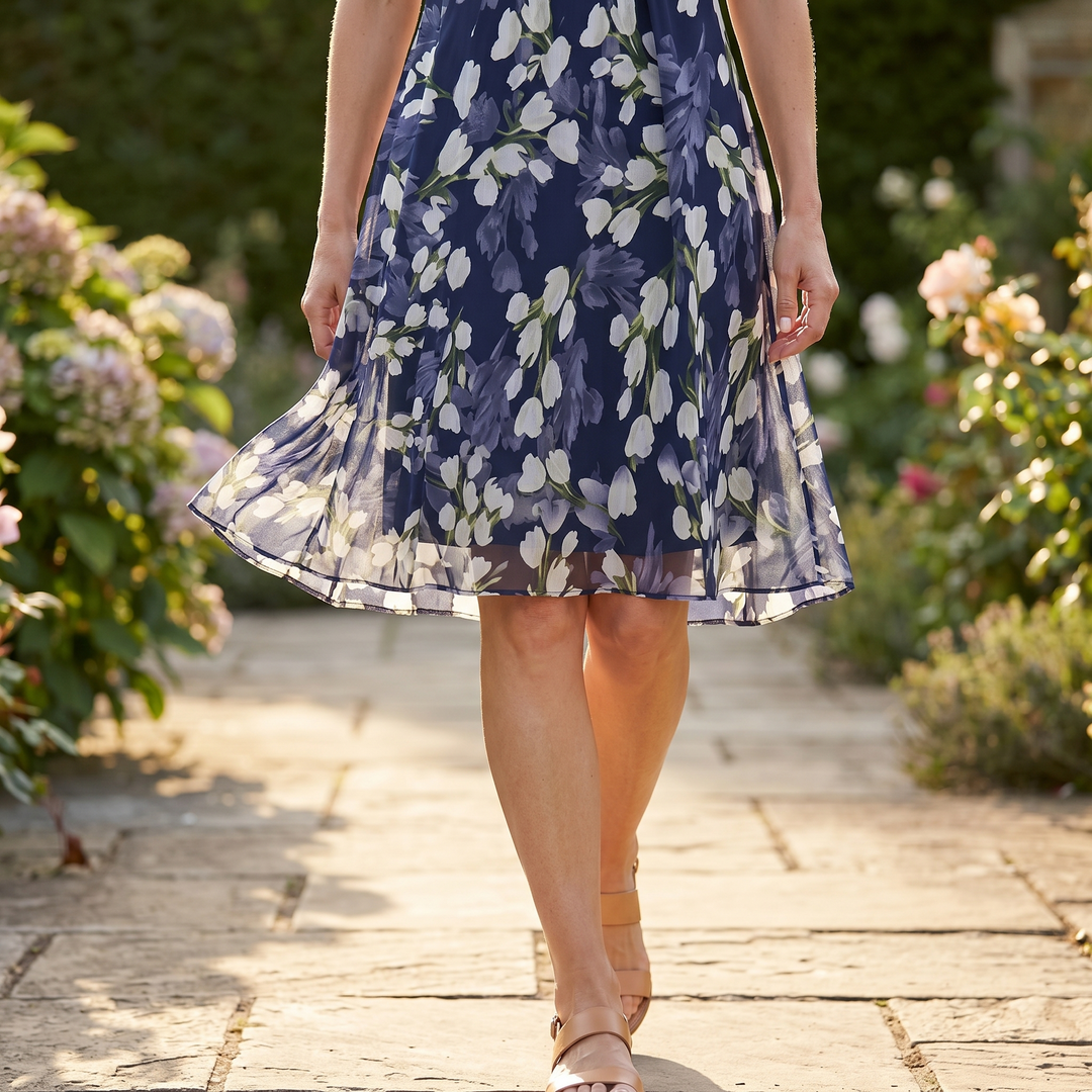 Genevora - Robe midi fleurie et aérienne